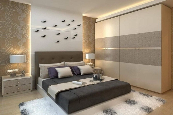 featuring an abstract wall art piece, bedside